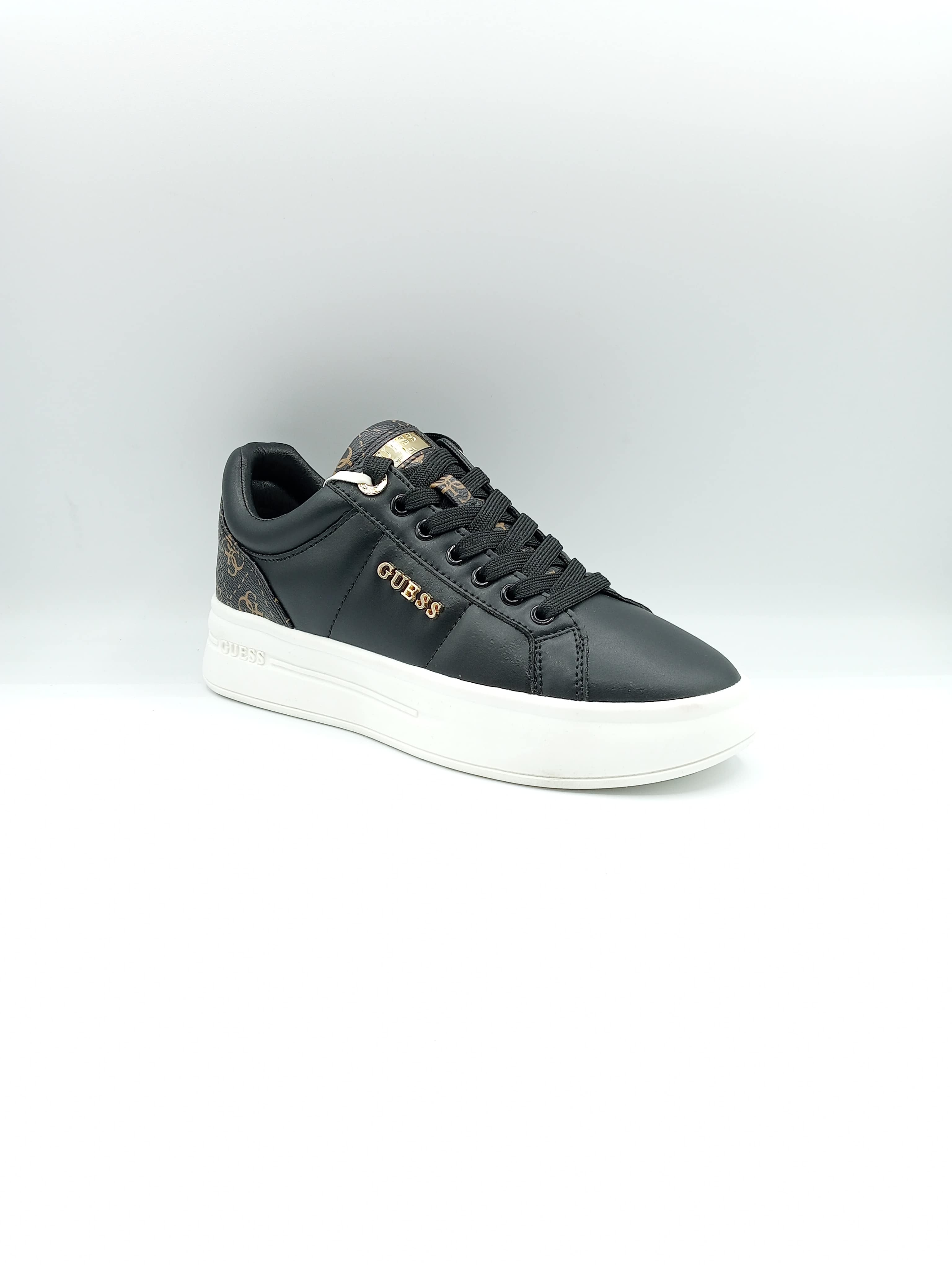 Sneakers Guess da donna in ecopelle nera con suola platform e logo dorato